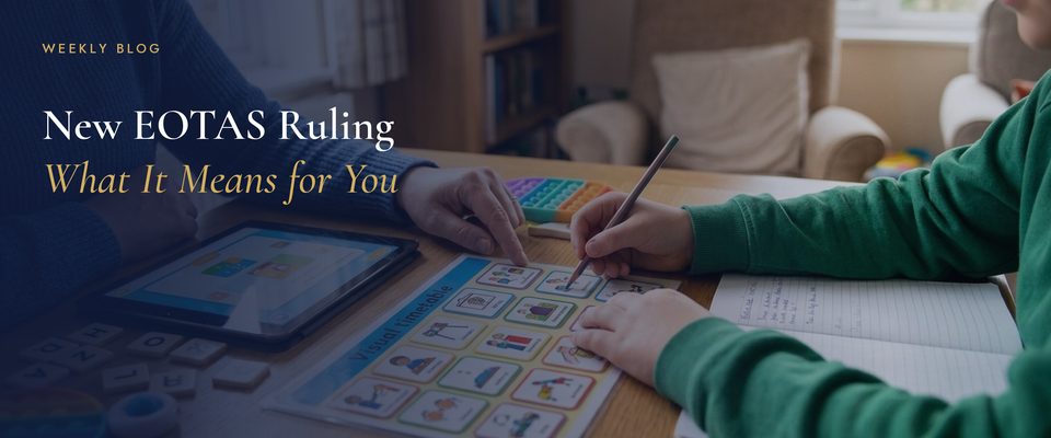 A child and adult working together at a table with a visual timetable
