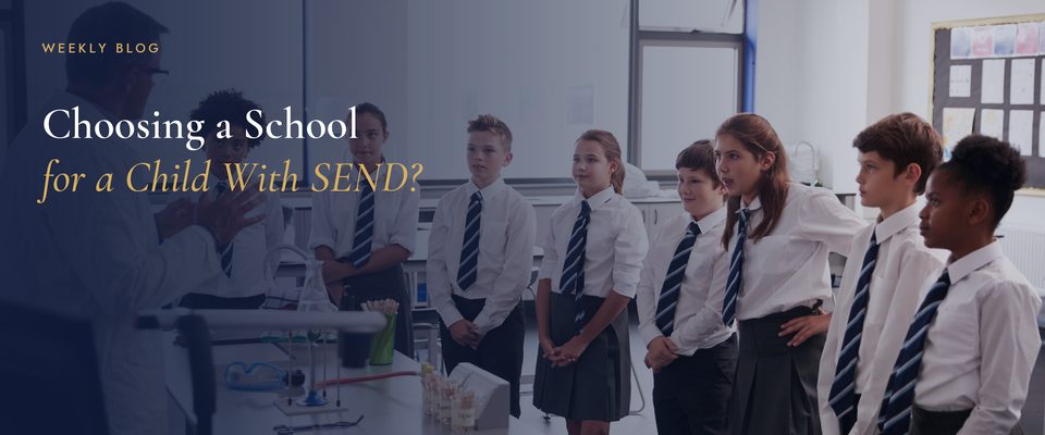 A secondary school teacher talking to a class of pupils in a science lab