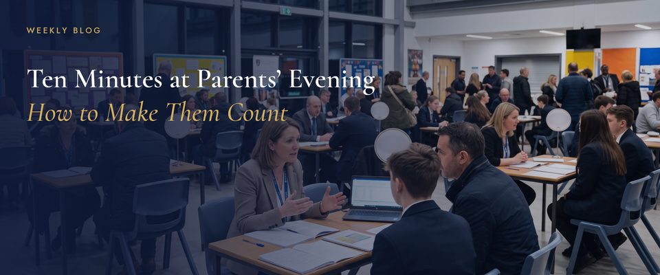 Parents and pupils talking with teachers at tables during a busy secondary school parents’ evening